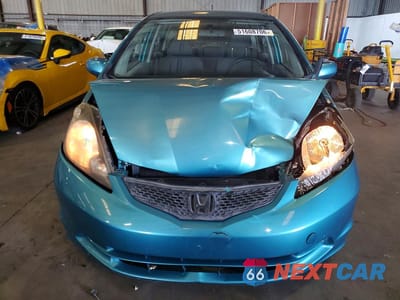 Piąte zdjęcie samochodu w środku: 2012 HONDA FIT VIN:JHMGE8H37CC010152 - miniatura