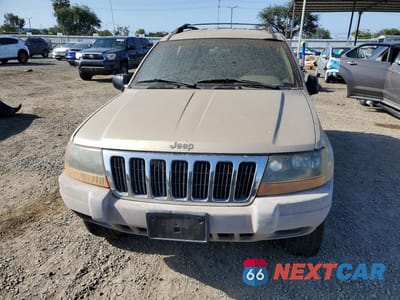 Piąte zdjęcie samochodu w środku: 2000 JEEP GRAND CHEROKEE LAREDO VIN:1J4GW48S0YC388328 - miniatura