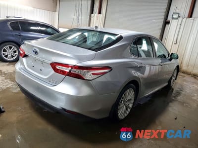 Trzecie zdjęcie samochodu z tyłu: 2019 TOYOTA CAMRY HYBRID XLE VIN:4T1B21HK0KU012915 - miniatura