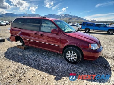 Czwarte zdjęcie samochodu z boku: 2004 KIA SEDONA LX VIN:KNDUP131546570831 - miniatura
