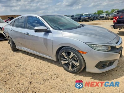 Czwarte zdjęcie samochodu z boku: 2017 HONDA CIVIC TOURING VIN:19XFC1F9XHE000152 - miniatura