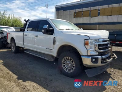 Czwarte zdjęcie samochodu z boku: 2021 FORD F350 SUPER DUTY VIN:1FT8W3BT9MEC49609 - miniatura