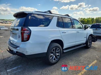 Trzecie zdjęcie samochodu z tyłu: 2021 CHEVROLET TAHOE K1500 Z71 VIN:1GNSKPKD4MR348047 - miniatura