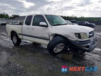 Czwarte zdjęcie samochodu z boku: 2002 TOYOTA TUNDRA SR5 VIN:5TBRN341428234342 - miniatura