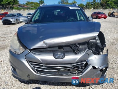 Piąte zdjęcie samochodu w środku: 2012 HYUNDAI TUCSON GLS VIN:KM8JU3AC6CU324419 - miniatura