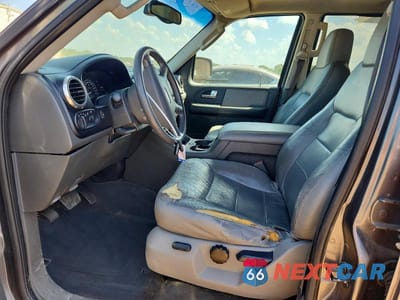 Zdjęcie 7 z 14 samochodu: 2003 FORD EXPEDITION XLT VIN:1FMPU16L33LA22616 - miniatura