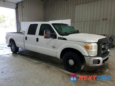 Czwarte zdjęcie samochodu z boku: 2015 FORD F350 SUPER DUTY VIN:1FT8W3ATXFEA95139 - miniatura