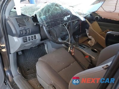 Zdjęcie 8 z 12 samochodu: 2011 TOYOTA TACOMA V6 VIN:3TMLU4EN8BM067863 - miniatura