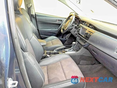 Piąte zdjęcie samochodu w środku: 2016 TOYOTA COROLLA S VIN:5YFBURHE9GP491380 - miniatura