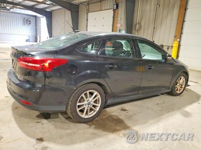 Trzecie zdjęcie samochodu z tyłu: 2015 FORD FOCUS SE VIN:1FADP3F25FL217449 - miniatura
