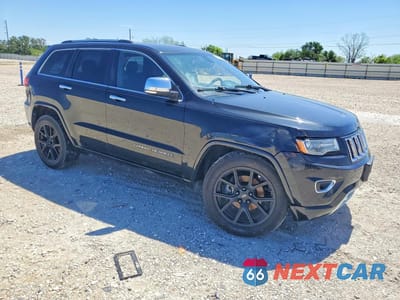 Czwarte zdjęcie samochodu z boku: 2014 JEEP GRAND CHEROKEE OVERLAND VIN:1C4RJECT7EC338315 - miniatura