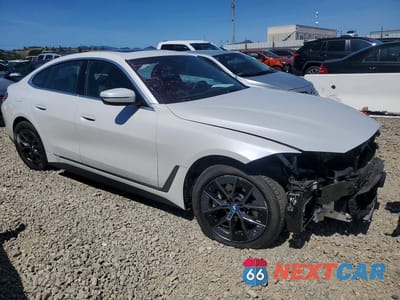Czwarte zdjęcie samochodu z boku: 2024 BMW I4 EDRIVE 35 VIN:WBY43AW0XRFR71893 - miniatura