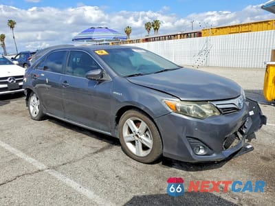 Czwarte zdjęcie samochodu z boku: 2012 TOYOTA CAMRY HYBRID LE VIN:4T1BD1FK8CU026866 - miniatura