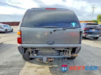 Zdjęcie 6 z 13 samochodu: 2002 CHEVROLET TAHOE C1500 VIN:1GNEC13T62R120738 - miniatura