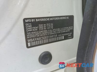 Zdjęcie 13 z 13 samochodu: 2014 BMW 740 I VIN:WBAYA6C50ED144154 - miniatura