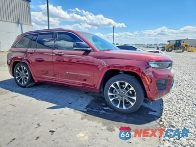Czwarte zdjęcie samochodu z boku: 2023 JEEP GRAND CHEROKEE OVERLAND 4XE VIN:1C4RJYD66P8802212 - miniatura