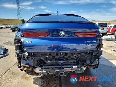 Zdjęcie 6 z 14 samochodu: 2022 BMW X6 M50I VIN:5UXCY8C04N9J15072 - miniatura