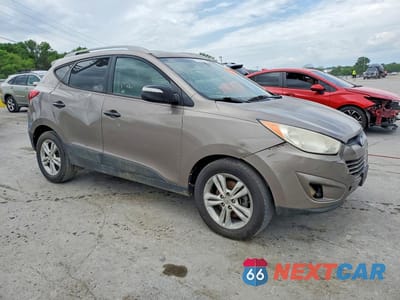 Czwarte zdjęcie samochodu z boku: 2013 HYUNDAI TUCSON GLS VIN:KM8JU3AC1DU563314 - miniatura
