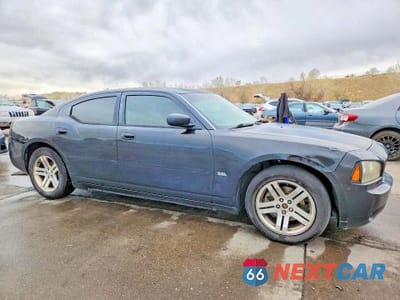 Czwarte zdjęcie samochodu z boku: 2006 DODGE CHARGER SE VIN:2B3KA43G06H444961 - miniatura