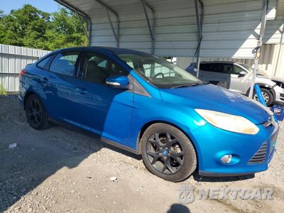 Czwarte zdjęcie samochodu z boku: 2013 FORD FOCUS SE VIN:1FADP3F22DL198601 - miniatura