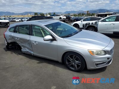 Czwarte zdjęcie samochodu z boku: 2015 VOLVO V60 PREMIER VIN:YV140MEB9F1190669 - miniatura