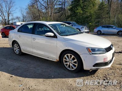Czwarte zdjęcie samochodu z boku: 2012 VOLKSWAGEN JETTA VIN:3VWDP7AJ7CM410001 - miniatura