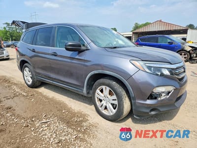 Czwarte zdjęcie samochodu z boku: 2017 HONDA PILOT LX VIN:5FNYF5H15HB043998 - miniatura