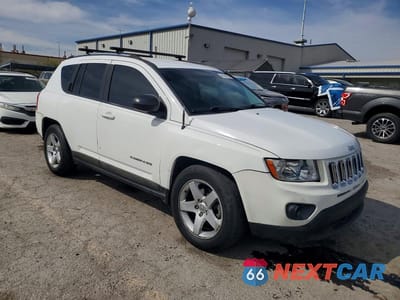 Czwarte zdjęcie samochodu z boku: 2011 JEEP COMPASS SPORT VIN:1J4NF1FB3BD135157 - miniatura
