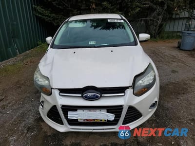 Piąte zdjęcie samochodu w środku: 2012 FORD FOCUS TITANIUM VIN:1FAHP3N22CL309097 - miniatura