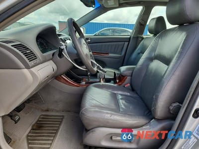 Zdjęcie 7 z 11 samochodu: 2002 TOYOTA CAMRY XLE VIN:4T1BE30K82U621930 - miniatura