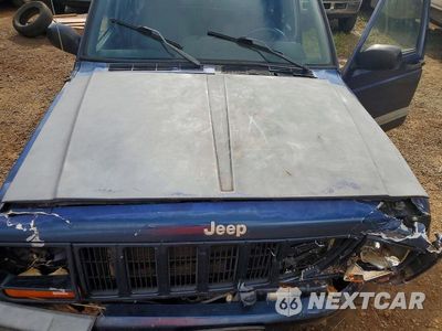 Zdjęcie 12 z 13 samochodu: 2001 JEEP CHEROKEE SPORT VIN:1J4FF48S21L610434 - miniatura