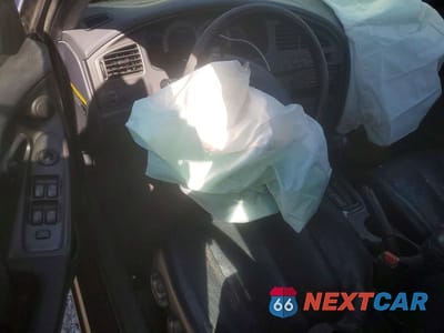 Zdjęcie 8 z 12 samochodu: 2003 HYUNDAI ELANTRA GT VIN:KMHDN55D93U079303 - miniatura