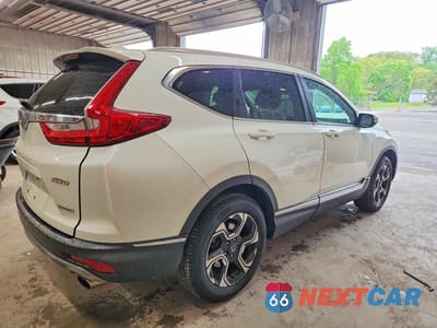 Trzecie zdjęcie samochodu z tyłu: 2017 HONDA CR-V TOURING VIN:2HKRW2H91HH650118 - miniatura