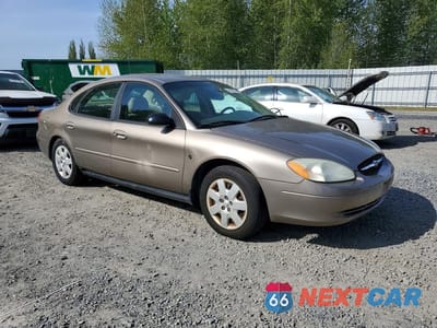 Czwarte zdjęcie samochodu z boku: 2002 FORD TAURUS LX VIN:1FAFP52202G210602 - miniatura