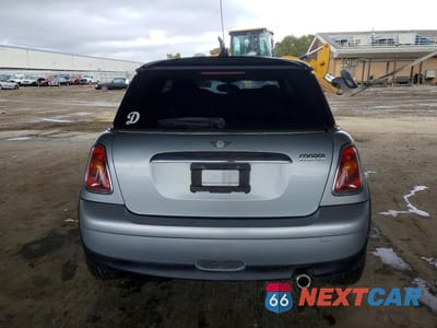 Zdjęcie 6 z 11 samochodu: 2007 MINI COOPER VIN:WMWMF33537TU60719 - miniatura