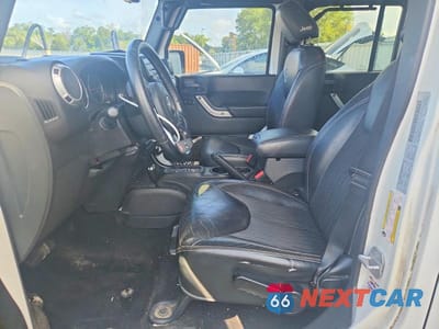 Zdjęcie 7 z 11 samochodu: 2015 JEEP WRANGLER UNLIMITED SPORT VIN:1C4BJWDG1FL572816 - miniatura