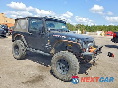 Czwarte zdjęcie samochodu z boku: 2012 JEEP WRANGLER SPORT VIN:1C4AJWAG3CL102055 - miniatura