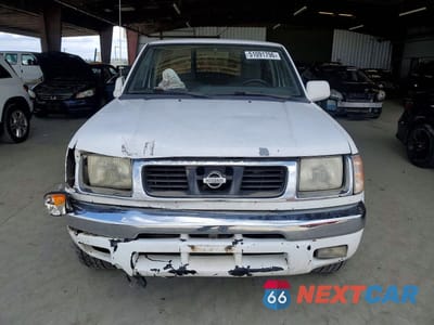 Piąte zdjęcie samochodu w środku: 2000 NISSAN FRONTIER XE VIN:1N6ED27Y2YC338377 - miniatura