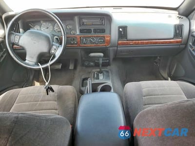 Zdjęcie 8 z 14 samochodu: 1998 JEEP GRAND CHEROKEE LAREDO VIN:1J4FX58S7WC317266 - miniatura