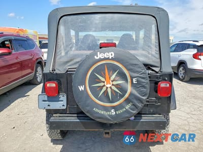 Zdjęcie 6 z 12 samochodu: 2000 JEEP WRANGLER / TJ SE VIN:1J4FA29P5YP702511 - miniatura