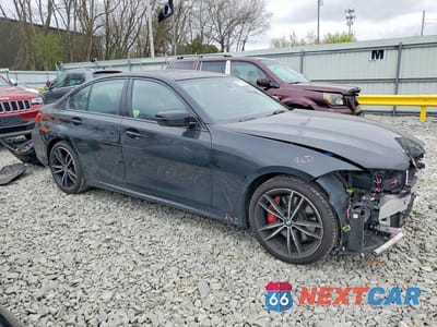 Czwarte zdjęcie samochodu z boku: 2023 BMW 330XI VIN:3MW89FF03P8D70617 - miniatura