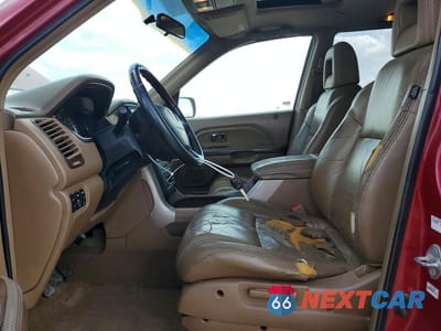 Zdjęcie 7 z 12 samochodu: 2005 HONDA PILOT EXL VIN:2HKYF18505H536710 - miniatura