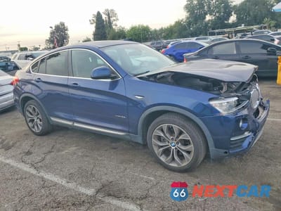 Czwarte zdjęcie samochodu z boku: 2015 BMW X4 XDRIVE28I VIN:5UXXW3C58F0F89167 - miniatura