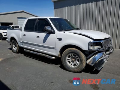 Czwarte zdjęcie samochodu z boku: 2001 FORD F150 SUPERCREW VIN:1FTRW07L11KE61610 - miniatura