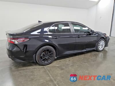 Trzecie zdjęcie samochodu z tyłu: 2024 TOYOTA CAMRY LE VIN:4T1C11AK3RU226518 - miniatura