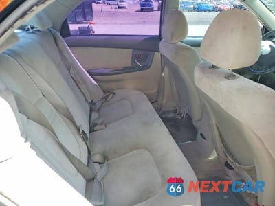 Zdjęcie 10 z 12 samochodu: 2004 KIA SPECTRA LX VIN:KNAFE121045018995 - miniatura