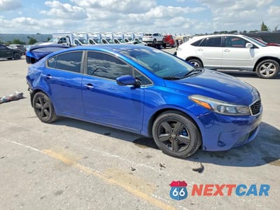 Czwarte zdjęcie samochodu z boku: 2018 KIA FORTE S VIN:3KPFL4A75JE196031 - miniatura