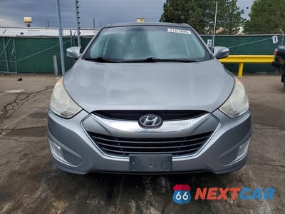 Piąte zdjęcie samochodu w środku: 2013 HYUNDAI TUCSON LIMITED VIN:KM8JUCAC6DU690592 - miniatura