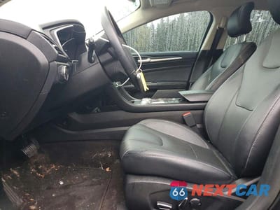 Zdjęcie 7 z 13 samochodu: 2019 FORD FUSION TITANIUM VIN:3FA6P0SU4KR177729 - miniatura
