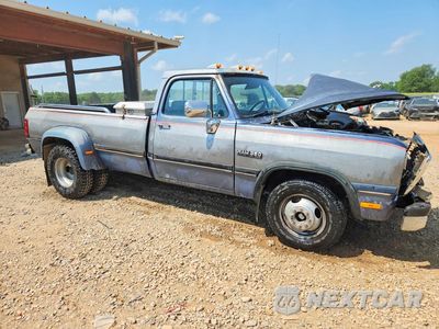 Czwarte zdjęcie samochodu z boku: 1991 DODGE D-SERIES D300 VIN:1B7ME36C4MS352322 - miniatura